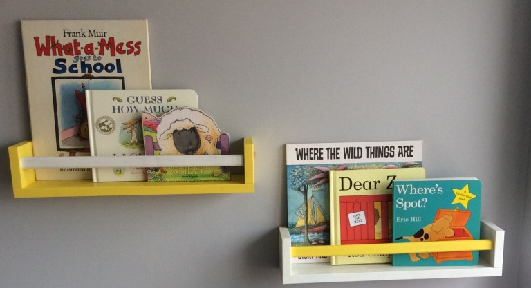 The IKEA spice rack shelves after a lick of paint