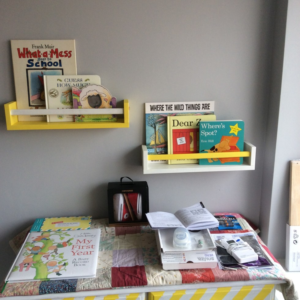 The IKEA spice rack shelves after a lick of paint